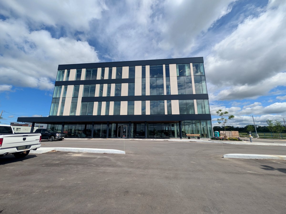The Stouffville Medical Arts building at 211 Sam Miller Way — a modern multi-story glass-and-dark-clad medical building where Stouffville Dental Studio is located